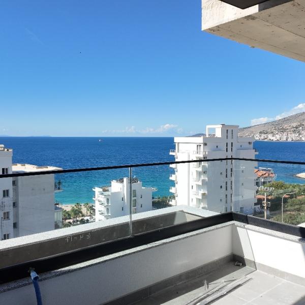 Apartament z widokiem na morze, 2 sypialnie, na sprzedaż w Sarandzie – 109 m², nowy budynek, 100 m od plaży